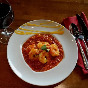 Jheenga Mango Curry (shrimp) is one of our most popular dishes.