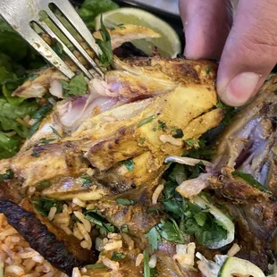 Super undercooked and almost raw Cornish Hen.