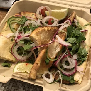 a sandwich in a styrofoam container