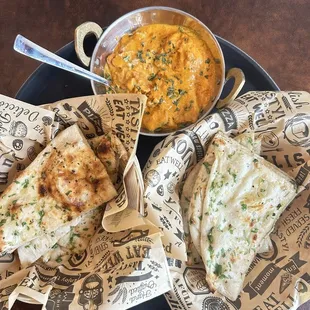 This is their flavorful butter chicken and absolutely delicious garlic naan bread.