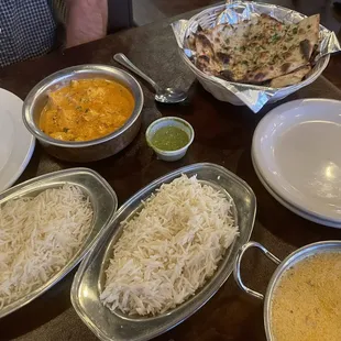 Table top view. Rice with our chicken dishes and naan.