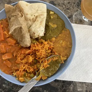 Chicken tikka masala, puri, palak paneer, Chana dal, and veggie biryani.