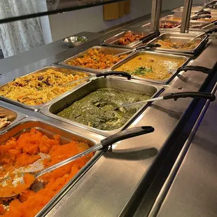 a buffet of different types of food