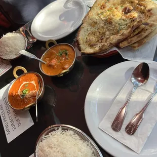 butter chicken and chicken tikka masala, each came with rice. also ordered the garlic and basil naan, very large and tasty portions!!