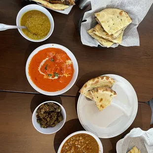 Left to right: naan, daal, butter chicken (highly recommend), okra, chick peas