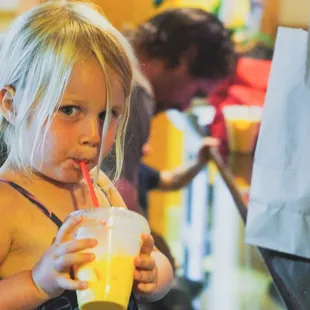 Baby Lila loves her mango lassi