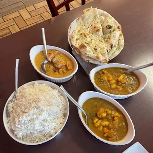 Plain Rice, Chicken Tikka Masala, Garlic Naan, and Shrimp Curry