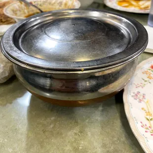 Steel Container for one order of Hyderabadi chicken dum biryani