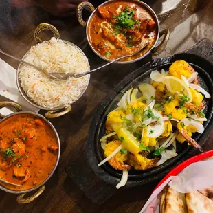 a table full of indian food