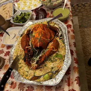Thanksgiving tandoori turkey with vegetable biryani, a side of chutney, salad, mashed Potatoes and gravy! So delicious!!!!!