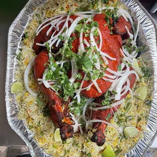 Whole Chicken Chargha on biryani rice
