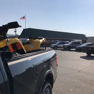 a pickup truck parked in a parking lot