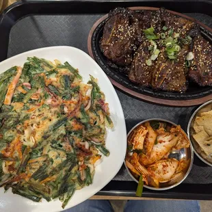 Korean pancake with squid ($17.99) and beef short rib BBQ ($29.99), Dec. 2024
