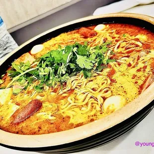 Laksa Broth w/ Spam, Mini Sausage, Quail Egg, Assorted Vegetables, Tofu, and Noodles