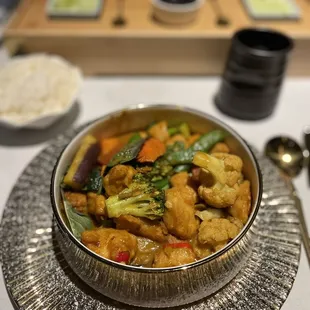 Panang curry chicken. Perfect pop of heat with undertones of coconut. Vegetables were crispy and flavorful.