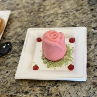 a dessert on a square plate