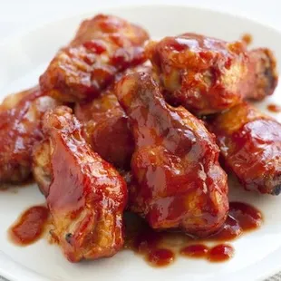 a plate of bbq wings