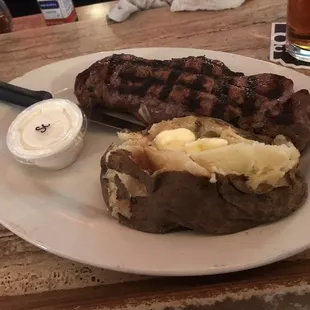 My rare steak. W/baked. Came with sour cream.