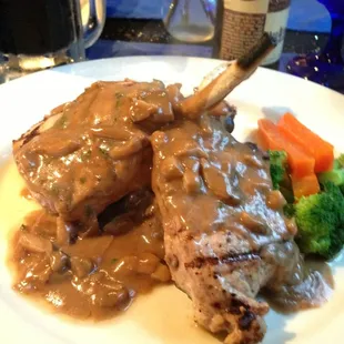 Pork chop French cut. Shroom pan gravy. Sausage bacon and cherry stuffing.