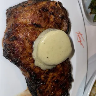 a steak with a side of broccoli