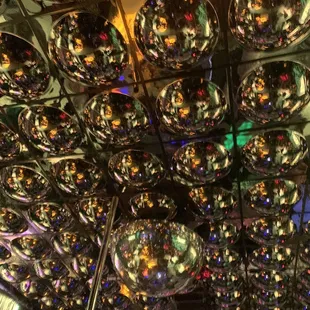 a ceiling of disco balls