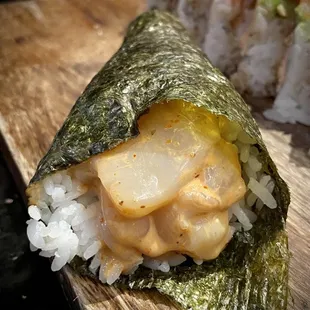 02.25.23 Up close of the spicy scallop hand roll.