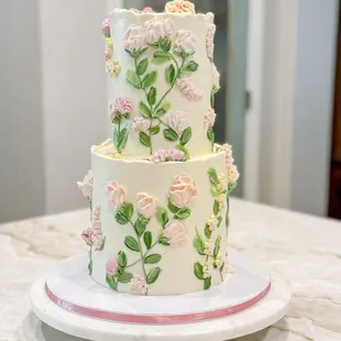 Buttercream florals make this cake a lovely centerpiece for your event