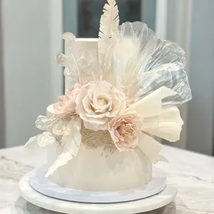Elegant engagement cake. Decorated with wafer paper florals and rice paper sails