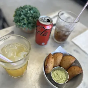 a bowl of food and a drink