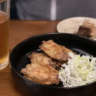 Chicken wings with spicy ponzu and cabbage salad