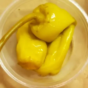 a bowl of yellow peppers