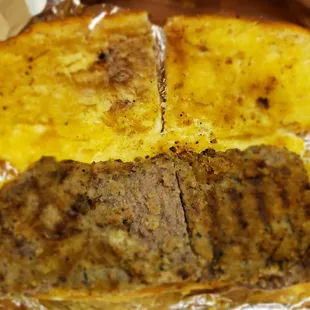 The Sicilian steak sandwich inside on garlic bread, my tweaking.