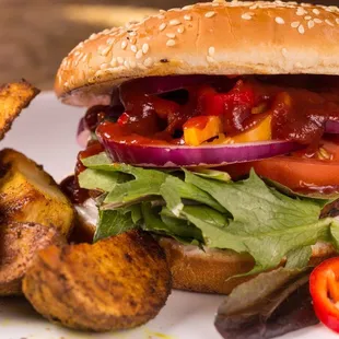 The Mandela Burger with baked curry potatoes.