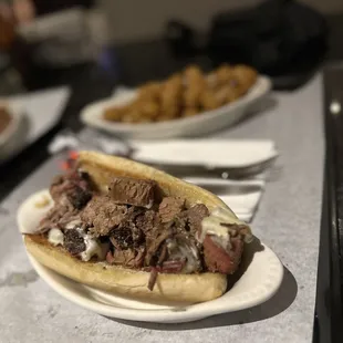 Chopped brisket sandwich w/tots