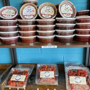 a shelf full of containers