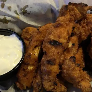 Buffalo flavored and charred chicken lips