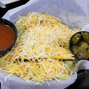 Basket of 4 crispy tacos. Jalapeños are extra