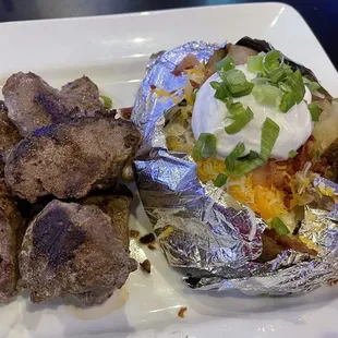 Steak tips and baked potato