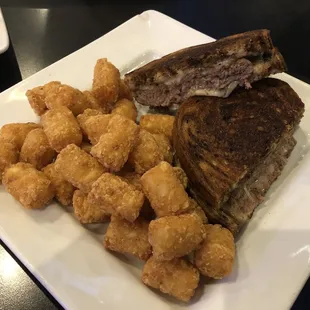 Patty Melt minus onions and tator tots.