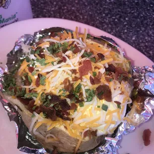 &quot;The Spud&quot; even tho it&apos;s described on the menu as coming loaded I was charged $1 to have it &quot;loaded&quot;