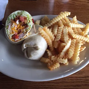 Turkey club wrap with fries