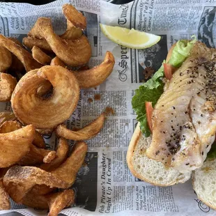 Grilled grouper sandwich with regular fries