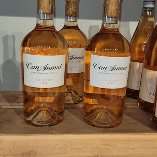 a row of bottles of wine