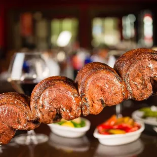 A great picture of their a side of steak marinated medium rare wonderful wonderful meat marinated well and full of flavor.
