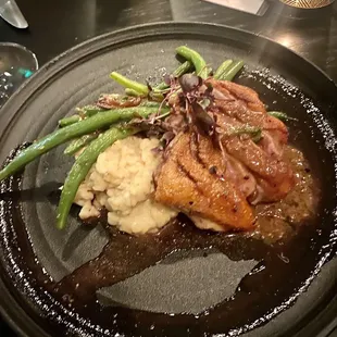 Duck breast with risotto and green beans