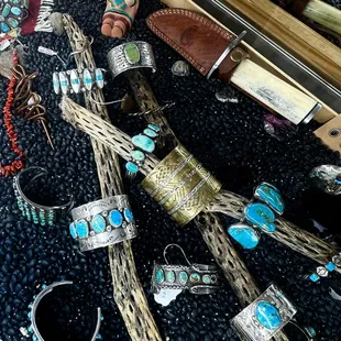 Custom made turquoise and silver cuffs and bracelets