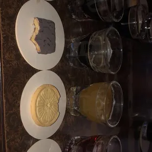 a table with desserts and drinks