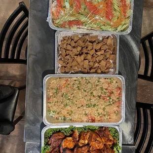 three containers of food