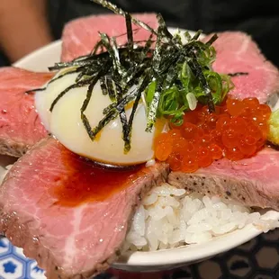 Beef and salmon roe over rice