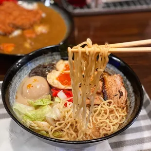 R2. Black Mayu Tonkotsu Ramen: good noodle texture. The highlights are the egg and the pork belly!